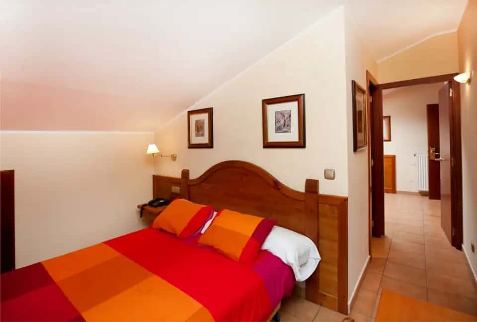 Deluxe Double Room - Spacious room with king bed, private balcony, and premium amenities